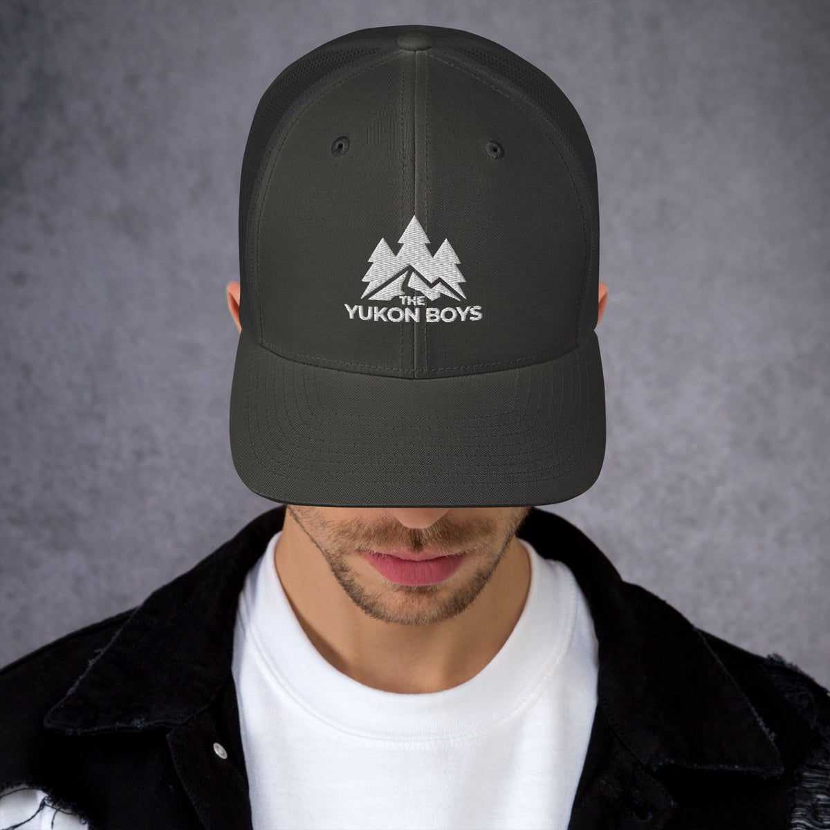The Yukon Boys Trucker Cap in Charcoal, front view