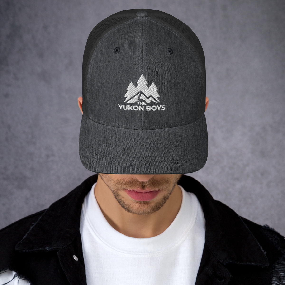 The Yukon Boys Trucker Cap in Dark Heather Gray, front view